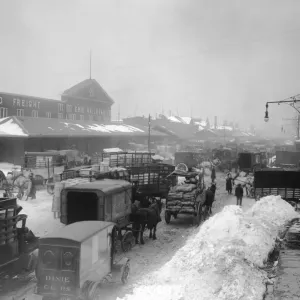 Railroad Snow; Horsedrawn carts crowd the intersection of West and Chambers Streets