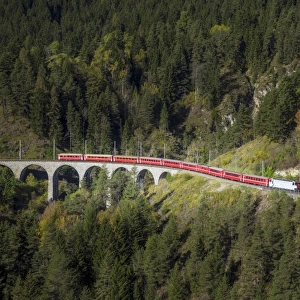 Red train in the mountains
