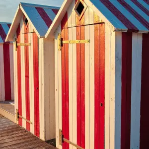 The red and white beach huts of Saint-Cyr-sur-Mer in France The red and white beach huts of Saint-Cyr-sur-Mer in France
