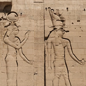 Relief of Isis and her son Horus at Temple of Isis in Philae