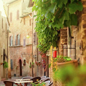 Restaurant tables in an old italian town in Tuscany, Italy
