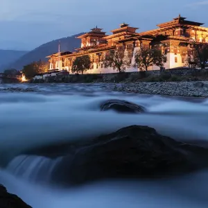 River and Illuminated Buildings of Punakha Print