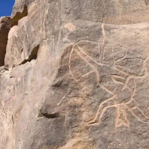 Rock engravings in the Wadi Mathendous, hunter with bow and arrow, Wadi Barjuj, stone desert, Libya, Sahara, North Africa, Africa Rock engravings in the Wadi Mathendous, hunter with bow and arrow, Wadi Barjuj, stone desert, Libya, Sahara, North Africa, Africa