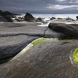 Rocky coast near Utakleiv, Haukland, Vestvagoya, Lofoten, Nordland, Norway