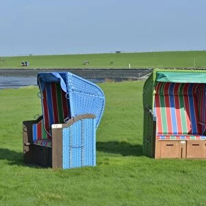 Roofed wicker beach chairs at the Horn swimming spot, Pellworm, North Frisia, Schleswig-Holstein, Germany