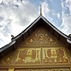 Roofing on Wat Phonxay Sanasongkham temple Laos