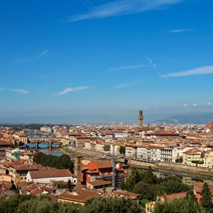 rooftop view of Basilica di Santa Maria del Fiore and Ponte Vecchio in Florence, Italy