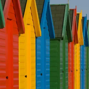 Row of multi-coloured beach huts Row of multi-coloured beach huts