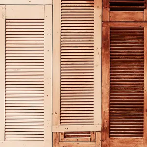 Rustic Wooden Shutter Panels in Warm Earth Tones for Interior Decor. Demonstrating Mocha color - trendy color of the year 2025 Rustic Wooden Shutter Panels in Warm Earth Tones for Interior Decor. Demonstrating Mocha color - trendy color of the year 2025