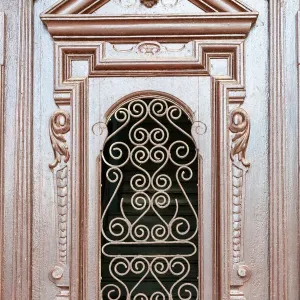 Sagua La Grande, Cuba, beautiful complex woodwork in colonial door Sagua La Grande, Cuba, beautiful complex woodwork in colonial door