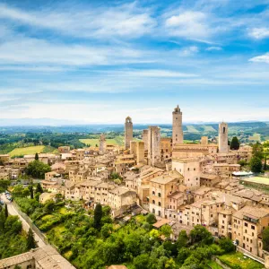 San Gimignano from above, aerial view from town to country. Tuscany, Italy