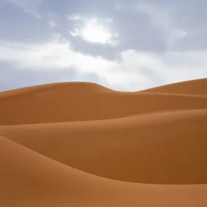Sand dunes and clouds in the Libyan desert, Sahara, Libya, North Africa, Africa Sand dunes and clouds in the Libyan desert, Sahara, Libya, North Africa, Africa