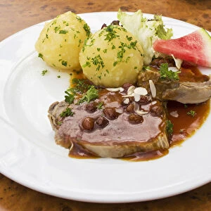 Sauerbraten, marinated pot roast with potato dumplings
