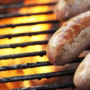 Sausages being grilled on a barbecue