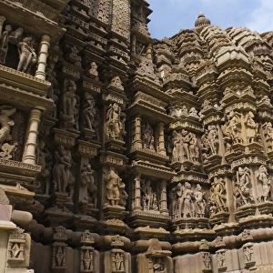 Sculptures on the wall of a temple, Lakshmana Temple, Khajuraho, Chhatarpur District, Madhya Pradesh, India