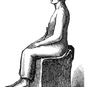 Seated statue of a man Seated statue of a man