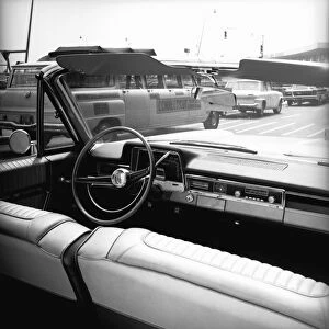 Front seats of convertible car, (B&W)