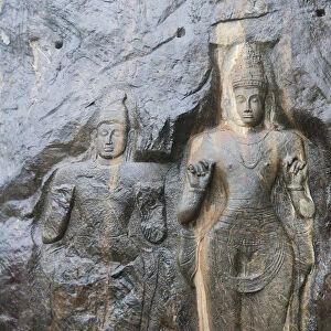 Shrine of Mahayana Buddhism, three old Buddha statues as rock reliefs, Buduruvagala, Wellawaya, Monaragala Distrikt, Sri Lanka