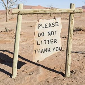 Sign Please do not litter in the parking lot, Sossusvlei, Namib-Skeleton Coast National Park, Namibia