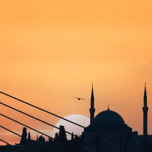 silhouette of Mosque and bridge at sunset, Istanbul, Turkey silhouette of Mosque and bridge at sunset, Istanbul, Turkey