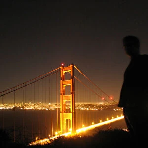 Silhouetted man with Golden Gate Bridge