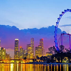 Singapore skyline and the Singapore Flyer at dusk