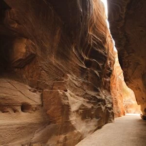 The Siq, a narrow stone gallery in Petra, Jordan
