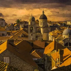 Skyline of Dubrovnik, Croatia at dusk with a view of rooftops and towers Skyline of Dubrovnik, Croatia at dusk with a view of rooftops and towers
