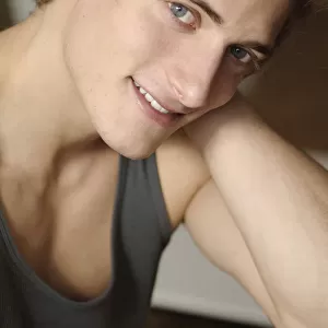 Smiling young man wearing underwear, portrait