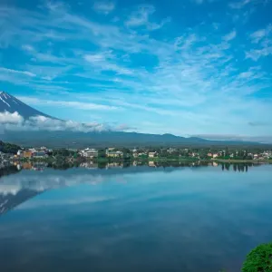 Snow cap Fuji Mountain and reflection on a sunny day, Kawaguchiko, Japan Snow cap Fuji Mountain and reflection on a sunny day, Kawaguchiko, Japan