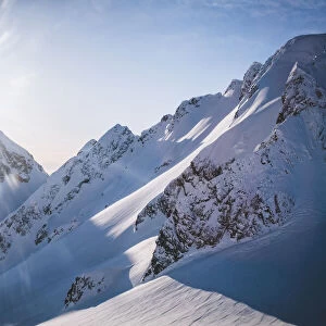 Snow covered Serratus Mountain in British Columbias Tantalus Range