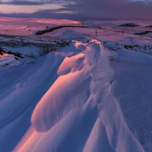 Snow Drifts at sunset in the Peak District National Park, Hayfield, UK