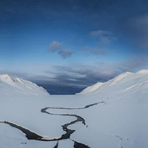Snowy landscape in a fjord, Iceland