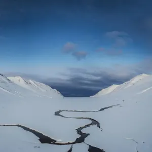 Snowy landscape in a fjord, Iceland Snowy landscape in a fjord, Iceland