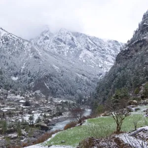 Snowy mountain valley landscape