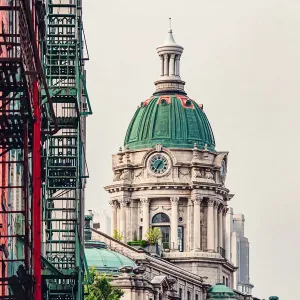 Soho district fire escapes with distant view of Neo-classical building in lower Manhattan Soho district fire escapes with distant view of Neo-classical building in lower Manhattan