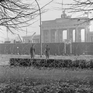 Soldiers and Barbed Wire at Berlin Wall Soldiers and Barbed Wire at Berlin Wall