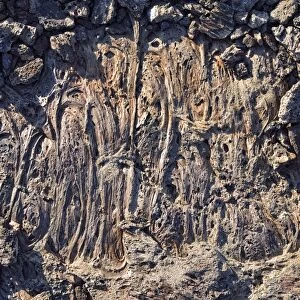 Solidified lava patches between volcanic rocks, spatter cones, Craters of the Moon National Monument, Arco, Highway 20, Idaho, USA