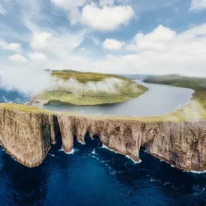 Sorvagsvatn, Leitisvatn lake hanging over the Atlantic Ocean, Faroe Islands Sorvagsvatn, Leitisvatn lake hanging over the Atlantic Ocean, Faroe Islands
