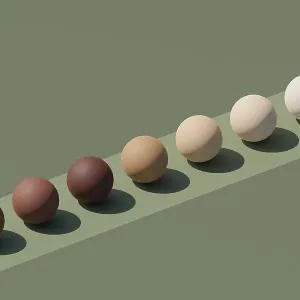 Spheres arranged in line in different skin tones Spheres arranged in line in different skin tones