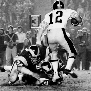 Steelers Quarterback Terry Bradshaw under pressure during Los Angeles Rams vs Pittsburgh Steelers 1975 Steelers Quarterback Terry Bradshaw under pressure during Los Angeles Rams vs Pittsburgh Steelers 1975