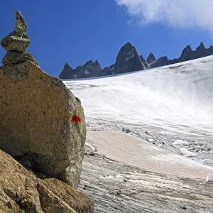 Steinmaennl, cairn made of stacked stones as a signpost on the edge of Orny Glacier in the Valais Alps, Switzerland, Europe