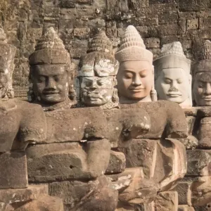 Stone angle statue on the way to bayon temple famous place near angkor wat in siemreap, cambodia Stone angle statue on the way to bayon temple famous place near angkor wat in siemreap, cambodia