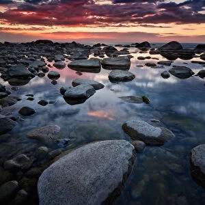 Stone beach at sunset