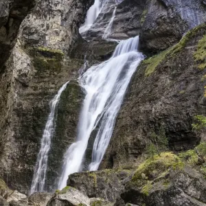 Strait waterfall in the Pyrenees in autumn, Ordesa Strait waterfall in the Pyrenees in autumn, Ordesa
