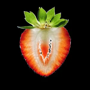 Organic Strawberry Slice Print on Black Background Organic Strawberry Slice Print on Black Background