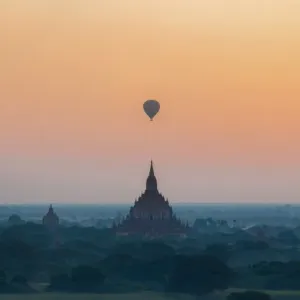 Sulamani pagoda temple with Hot air bolloon in the morining fog and sunrise before earthquake bagan, Myanmar