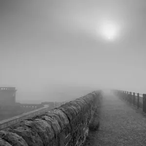 Sun in the mist at Ladybower dam
