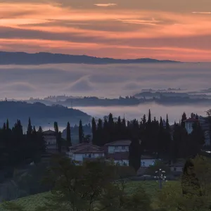 Sunrise over mist, Tuscany, Italy