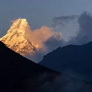 Sunset at Ama Dablam mountain peak, Everest region